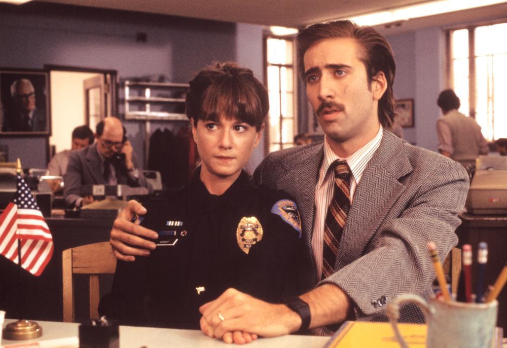 Still of Nicolas Cage and Holly Hunter in RAISING ARIZONA (1987)