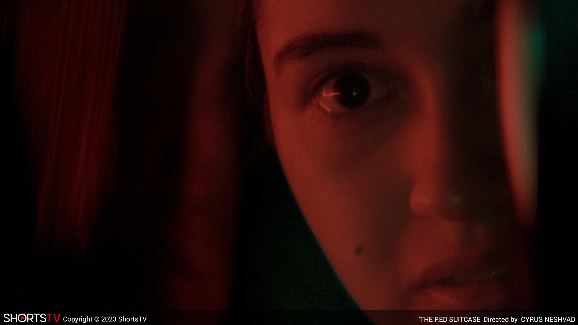 Still from the short film THE RED SUITCASE (2022)
